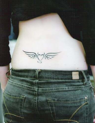 Love Tattoos tribal at women under back