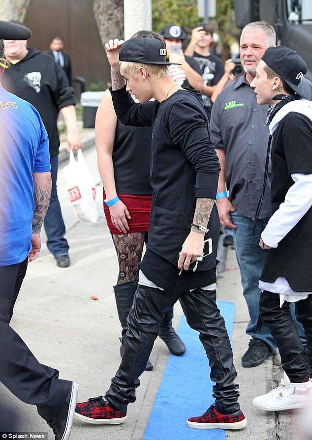 Fan friendly: People showed up to snap photos of Justin as he arrived 