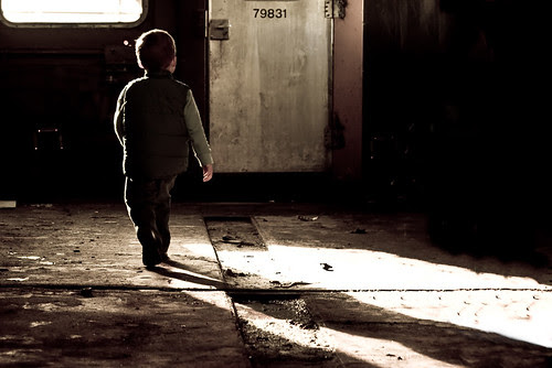 Boy in Train car by Jen Arthur