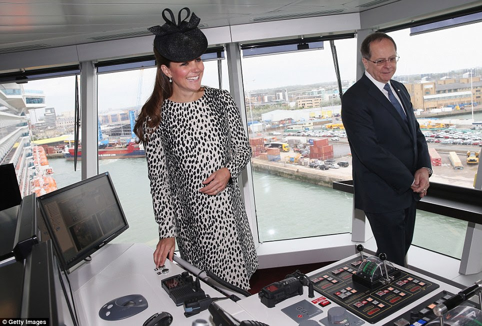 Captain Kate: The Duchess tries out a few buttons up on the Royal Princess' bridge much to the delight of Princess Cruises CEO, Alan Buckelew 
