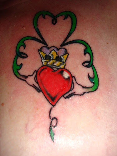 LOU AND I HAD DECIDED AWHILE BACK TO GET MATCHING TATTOOS SINCE WE 