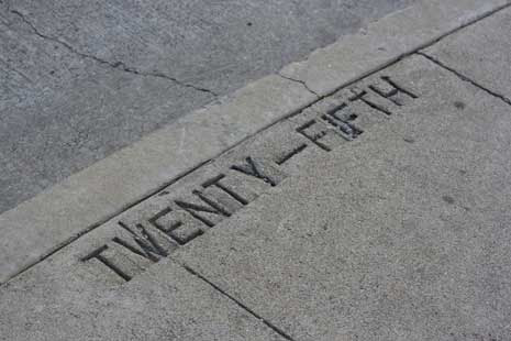 'Twenty-Fifth' carved into the sidewalk