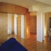 Officina Leonardo, Rome, Italy, green renovation, apartment transformation, wood siding, wood cladding, sliding doors, natural light, twin flats, mosaic floors, parquet floor