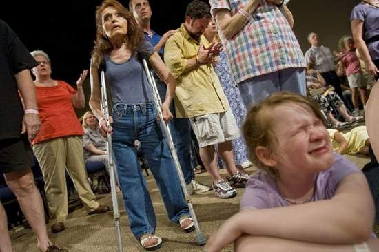 Polio sufferer Terri Hall waited to be touched by preacher Todd Bentley 