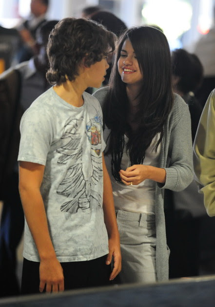 Selena Gomez And Co-Star Jake Austin Stay Close At LAX