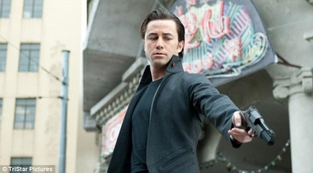 Spot the difference! The prosthetics make Gordon-Levitt look a lot like Willis in the movie 