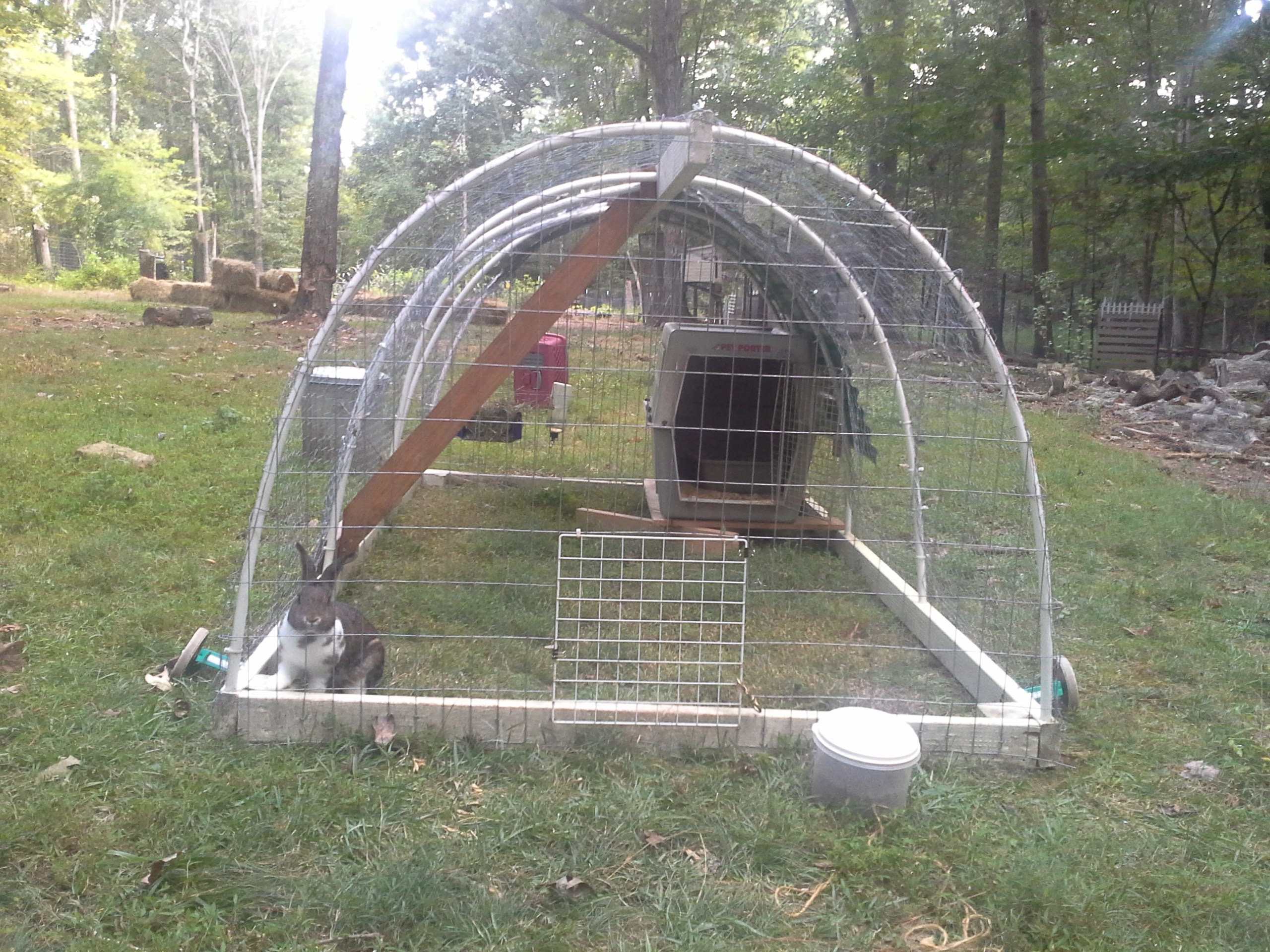 tractor. About as cheap and fast as you can get, made from 2x4s, PVC 