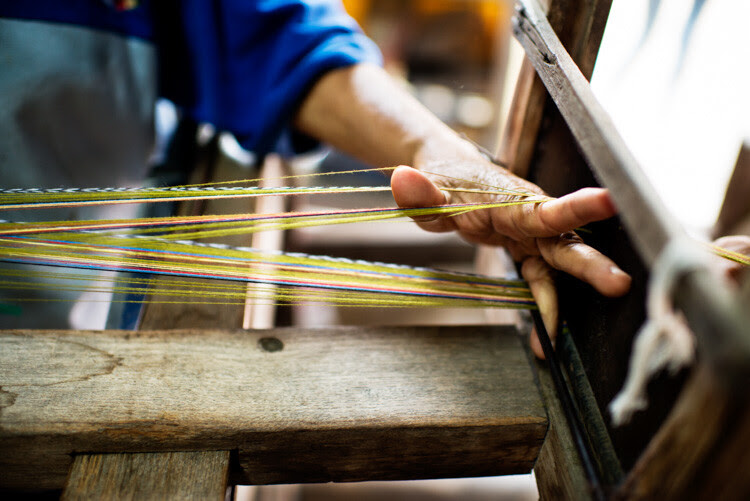 Preparing silk thread fo weaving. Why Volunteering is a Great Way to Grow as a Photographer