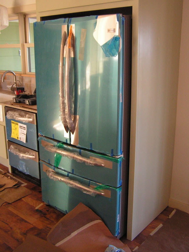 GE PROFILE REFRIGERATOR. PROFILE REFRIGERATOR - 32 WIDE