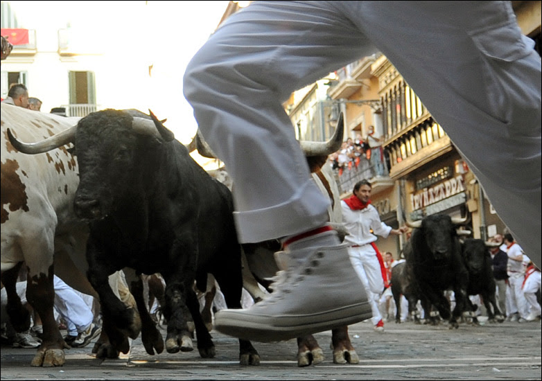 Bull and runners at Pamplona 