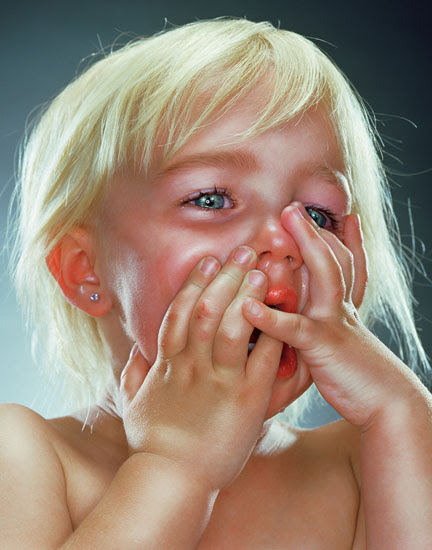  an exhibition of photographs of children by Julie Blackmon, 