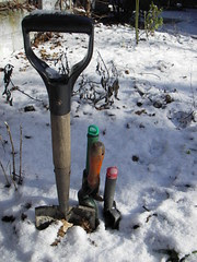 shovels in the snow