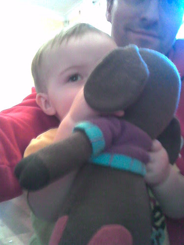Oliver (and Julien) sitting on Daddy's lap