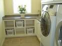 TodaysMama.com - DIY Laundry Room Cabinets