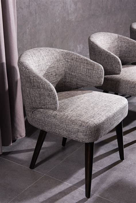 Looking for a modern twist to update your entertaining space? Modrest Carlton Modern Grey Fabric Dining Chair - Dining