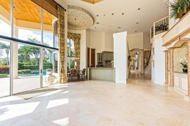The new owners will have no problem getting their daily vitamin D with floor to ceiling windows in the sitting roof off of the kitchen.