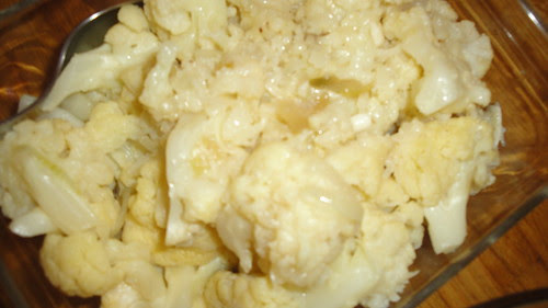 Sauteed Cauliflower florets sauteed with shallots and garlic 炒菜花
