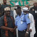 Rochas Okorocha in handshake with the representative of the Nigerian Police force in Owerri