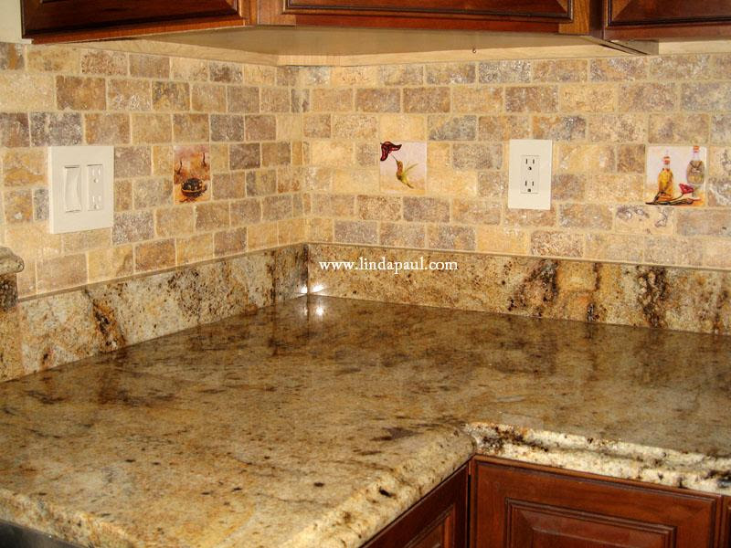 Need simple kitchen backsplash ideas? Just a few accent tiles placed in your 