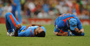 Irfan Pathan and Suresh Raina after their collision Irfan Pathan and Suresh Raina after their collision