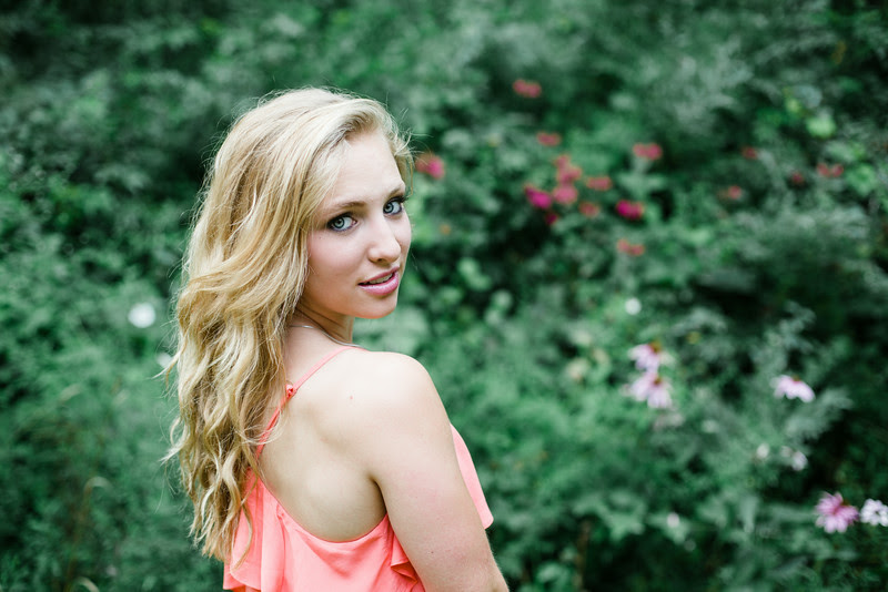 Photos taken outdoors in woods, nature, outdoors setting outside Rockford IL on private property. These summer time senior photos were taken in the early evening. Photo by Mindy Joy Photography