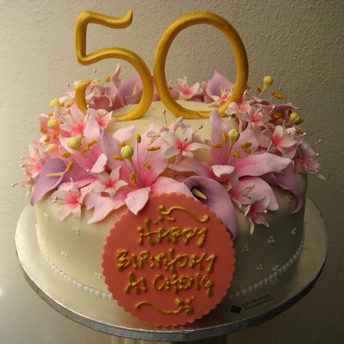 cake design by allan yap and e.t. yew. a 50th birthday cake for a lady who 