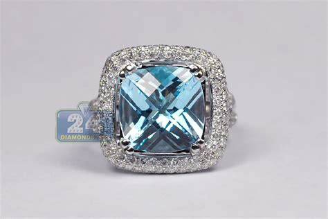 You may be willing to part with your unwanted or old gold jewelry to add some cash to your wallet. Ladies Blue Topaz Diamond Cocktail Ring 14K White Gold 10
