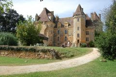 From the swimming lake you can see the roofs of chateau at Lanquais - designed by the same architect as the Louvre