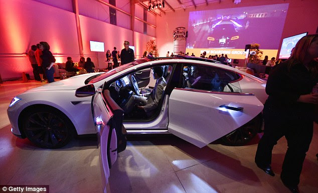 Tesla today announced similar safety features on its new dual-motor sedan. The vehicle features a system that moves the car over a lane when the driver uses the turn signal. It will also use cameras to read speed limit signs and decelerate accordingly