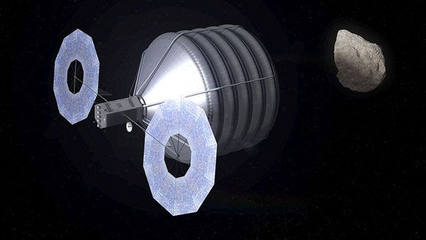 An artist's concept of NASA's asteroid retrieval spacecraft approaching a Near-Earth Object.