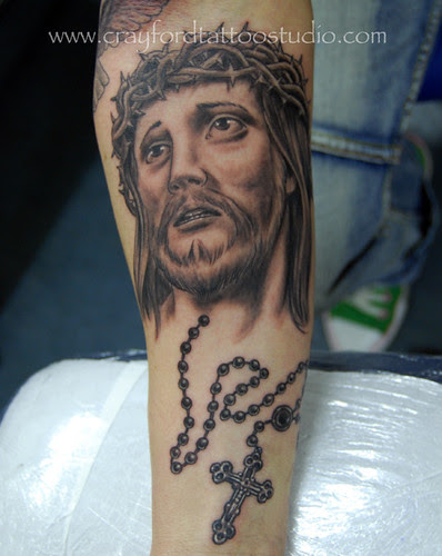 Jesus and Rosary Beads Tattoo. Tattooed by Ray at The Tattoo Studio, 