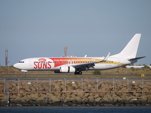 gold coast suns logo. Gold Coast Suns logo jet