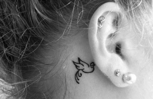 Small Bird Tattoo Behind Ear
