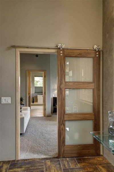 Barn Door Inside House: A Rustic And Cozy Bedroom Design