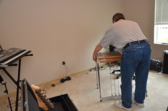 Setting up a steel guitar setting on floor