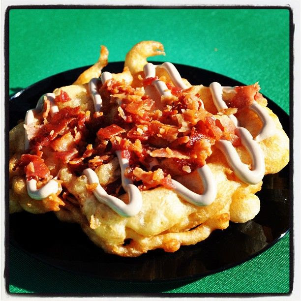Yum... Bacon maple funnel cake at Six Flags Magic Mountain.#SixFlags