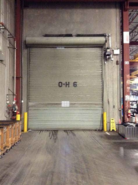 Looking for a garage door repair company near you? Rolling Steel Service Doors - Absolute Commercial Garage