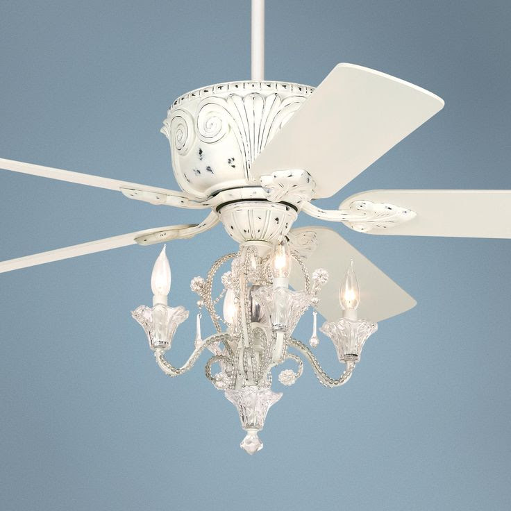 ... bedrrom..chandelier and a fan for the warm Florida weather