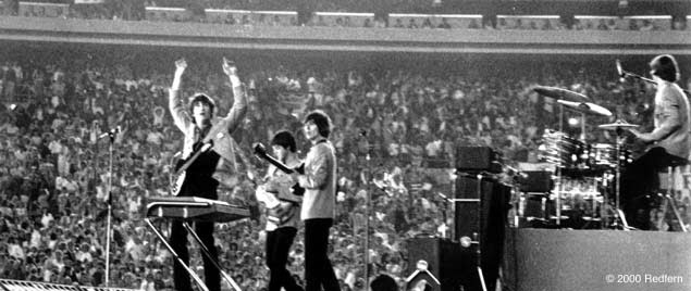 The Beatles play Shea Stadium in 1965