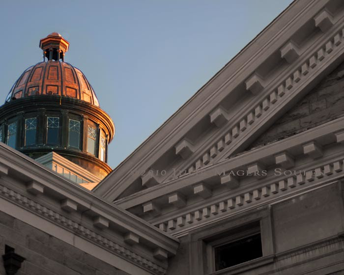 Copper dome on classical Doric architecture building.
