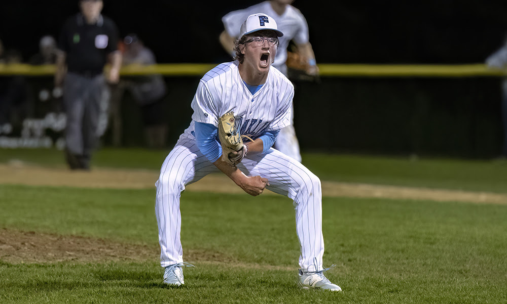 Franklin senior Alfred Mucciarone celebrates after recording his 10th strikeout to seal the win over Taunton. (Ryan Lanigan/HockomockSports.com)