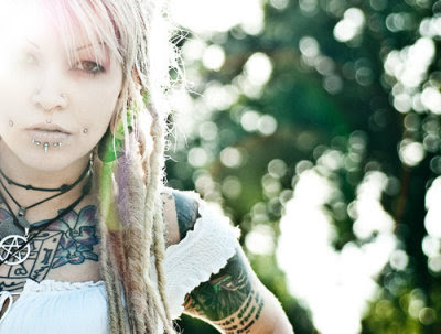 I find tattooed and pierced people attractive. More attractive than they 