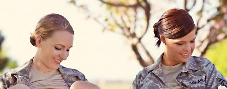Woman in uniform breastfeed (Brynja Sigurdardottir)
