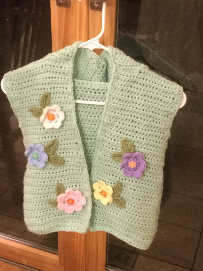 Crocheted Girl S Hooded Vest With Flowers