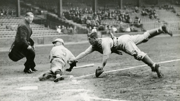 Mickey Cochrane and Pinky Whitney in a close call at home base