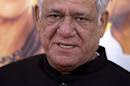 Actor Om Puri arrives for the world premiere of the film 'The Hundred-Foot Journey' in the Manhattan borough of New York