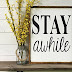 Stay Awhile Magnolia Sign - Constructed from metal, this metal door art makes for a durable decor item to welcome gue