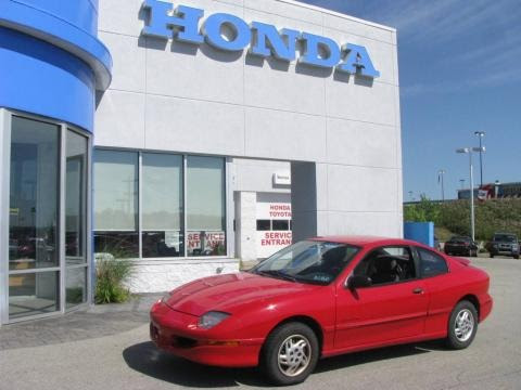 1998 Bright Red Pontiac Sunfire SE Coupe