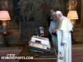 Queen Elizabeth greets the Pope in Holyrood Palace