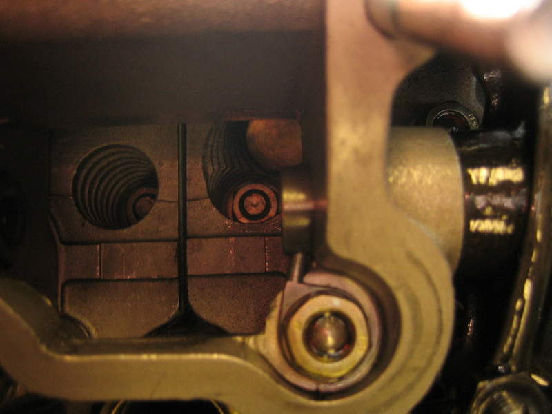 I believe that the 935 used a rocker shaft retainer system to prevent the 